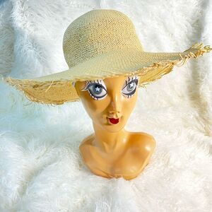 Woman’s Wide Brimmed Hat Straw Hat fringed Edge